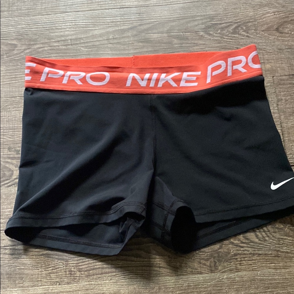 Nike Black and Red Athletic Shorts with Compression Fit